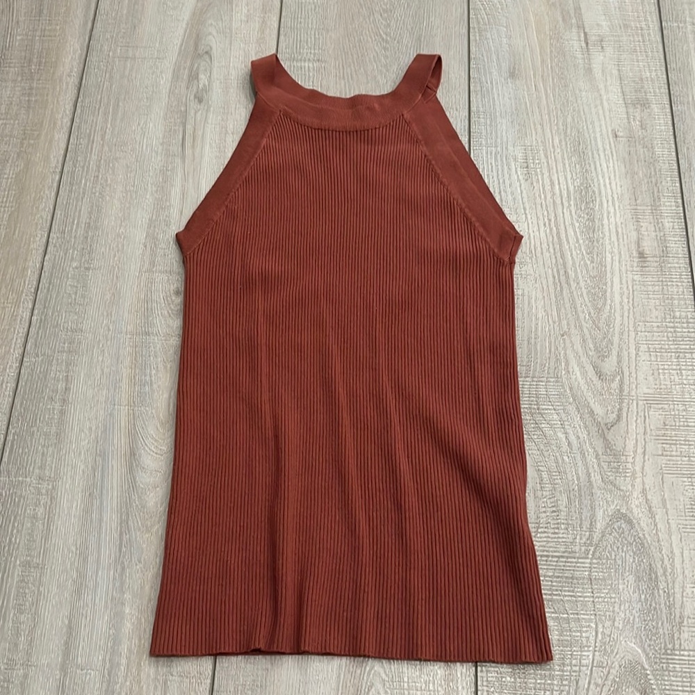 Rust colored tank.